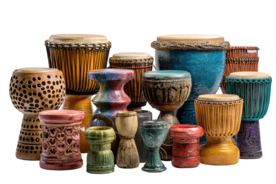 A collection of colorful, varied hand drums with skin tops, in a studio setup