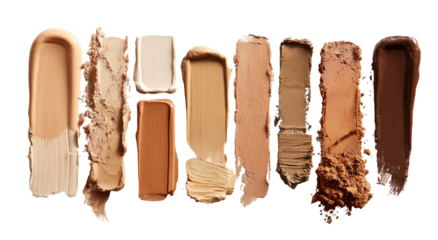 Smears of various makeup colors against a black background, showing textures and shades