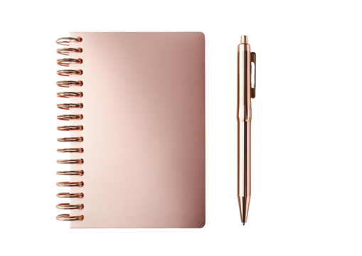 Shiny rose-gold notebook and pen set against a black background