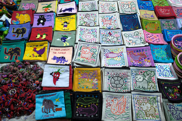 Night market. Artists selling their paintings to tourists. Luang Prabang. Laos.