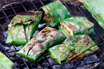 Laotian culinary specialties cooked in a banana leaf. Luang Prabang. Laos.