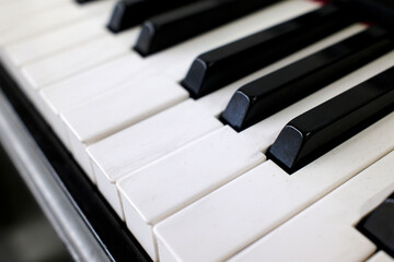 Music. Keyboard of a grand piano.  White and black keys. Ho Chi Minh city. Vietnam.