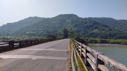 revdanda salav bridge on kundalika river in maharashtra in india.
