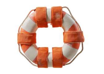 Close-up of a classic orange and white life preserver ring, against a black backdrop
