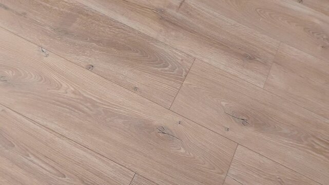 Looping texture of warm wooden planks with rich grain detail. Natural tones, smooth surface, and subtle movement-perfect for backgrounds, transitions, or mood scenes