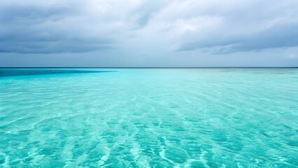 Fototapeta premium Shallow Waters Shift Gently From Radiant Turquoise To Deep Ocean Blue, Creating A Mesmerizing Gradient Of Color That Captures The Essence Of Coastal Beauty And Serene Summer Calm