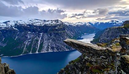 Trolltunga Cliff Overlooking Ringedalsvatnet Lake in Norway.