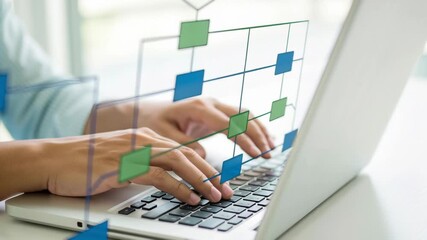 Hands typing on laptop with digital flowchart design, representing technology and innovation - Powered by Adobe