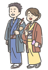 着物を着て初詣に行く若い男女カップル