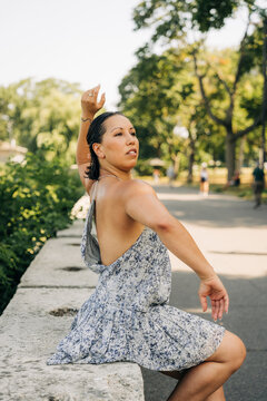 Woman dancer performing contemporary dance steps in park