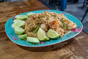 Thai Shrimp Fried Rice (Khao Pad Goong) on a Wooden Table