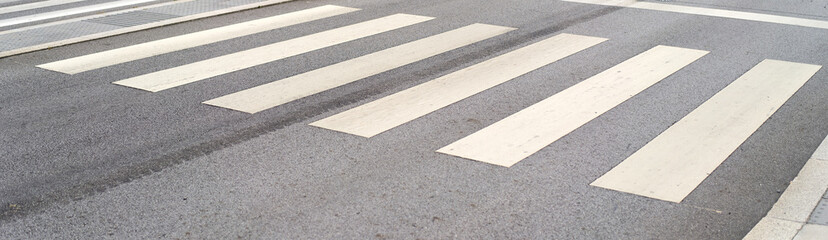 Fototapeta premium Urban downtown crosswalk with safety pedestrian path