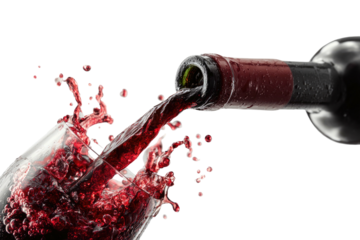 A vibrant shot of red liquid cascading from a bottle into a glass, against black background