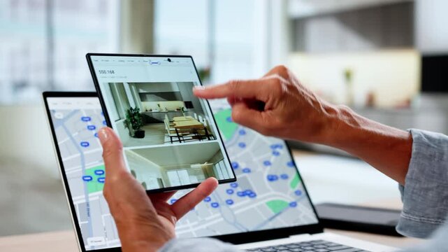 Woman Looking At Real Estate Portal