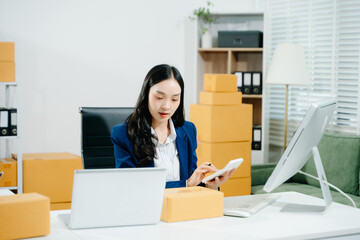 Small business entrepreneur SME freelance team woman working at office, BOX,tablet and laptop online, marketing, packaging, delivery