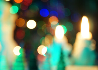 Blurred background. Decorative Christmas candles.