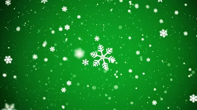 Snowflakes falling on green background