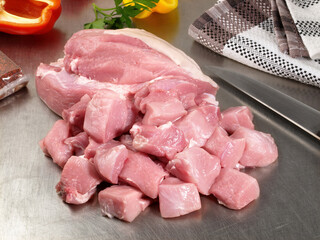 Raw Pork Meat - Goulash on a Butcher Board