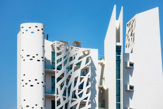 Monaco, Monaco - June 28, 2025: The Simona building designed by architect Jean-Pierre Lott featuring contemporary white facade and geometric patterns