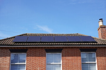 solar energy photovoltaic cells on roof of house. solar energy panels 