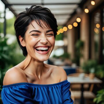 Cinematic close-up portrait of smiling pixie cut woman