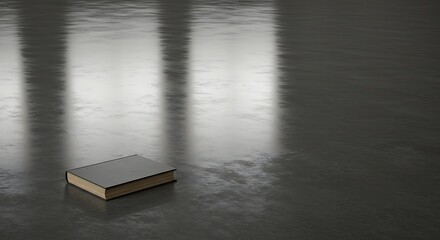 Dark Book on Reflective Surface