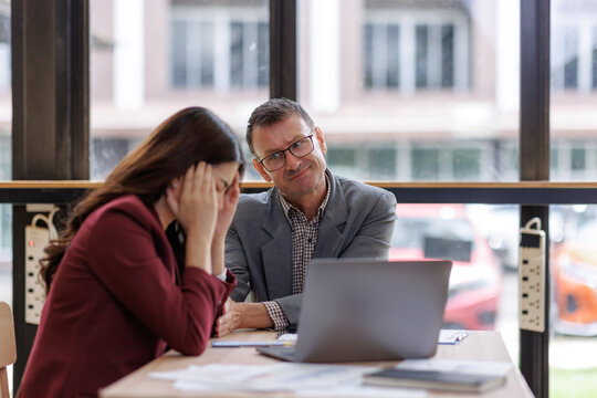 Employee feeling stressed receiving criticism from boss