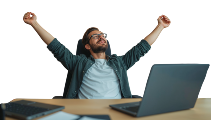 a triumphant man in casual, stretching his arms upwards in celebration. a laptop devices visible on the desk on a transparent background captures a moment of success, relief, radiating positive energy