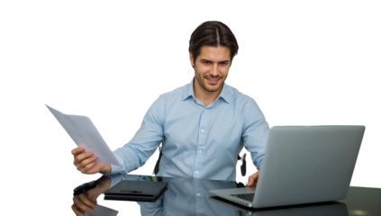 a professional man, dressed in a light blue shirt, sits at a desk with a laptop and tablet. he smiles, looking at his laptop while holding documents in one hand. this high-quality png on a transparent