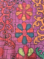 graffiti on the ground by a homeless man in Bucharest, Romania