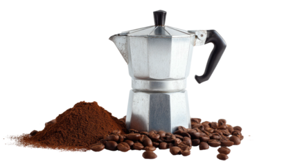 A silver coffee maker sits beside a pile of ground coffee and scattered roasted beans