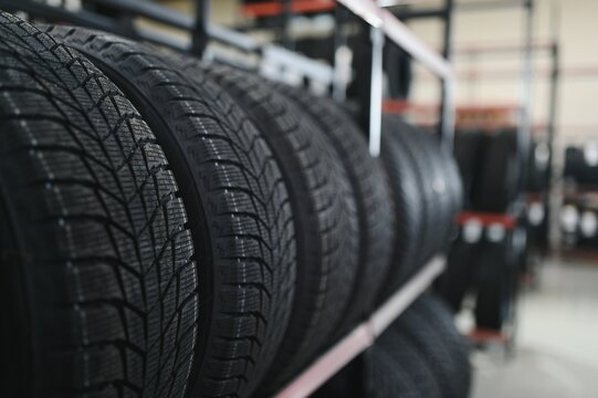 New car tire is placed on the tire storage rack in the tire factory. Be prepared for vehicles that need to change tires