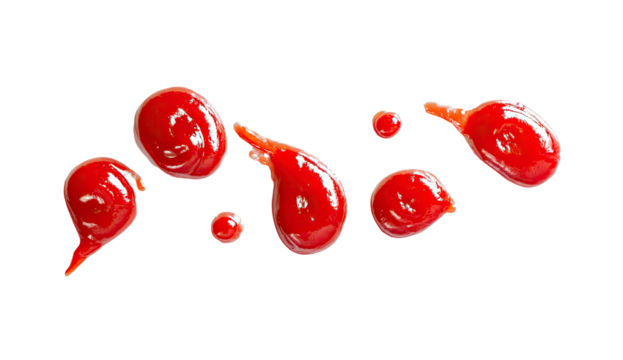 Vivid red splatters on black background, resembling droplets and irregular shapes, offering a graphic element