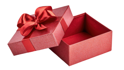 Opened red gift box with shiny ribbon and bow festive present concept for celebration isolated on white background