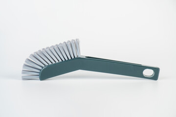 Blue toilet brush on white background