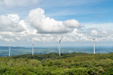 Renewable Wind Energy Turbines on Lush Green Mountain Landscape in Asia