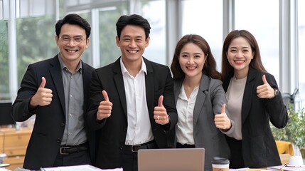 Diverse business team cheerfully gives thumbs up expressing success in modern office workplace setting.
