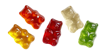 Assortment of colorful, translucent gummy bear candies against a pure black background