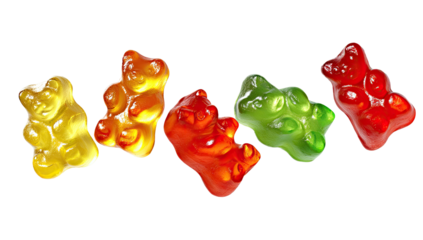 Five colorful translucent gummy bear candies in a row on a black background
