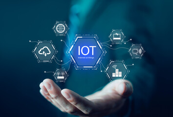 Businessman presenting Internet of Things (IoT) network with digital icons, cloud computing, smart technology, and data connection concept for innovation, communication, and automation.