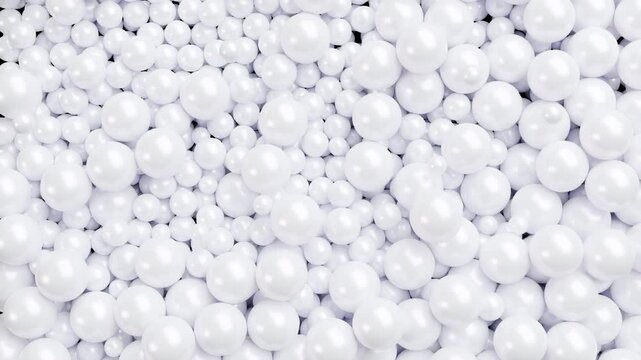 Soft white spheres gracefully move and cover the entire frame in a sleek monochrome style. Minimal 4K animation with alpha channel, perfect for motion designers and video editors.