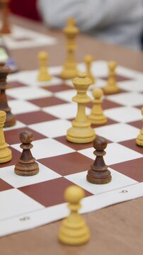Top view of chess pieces on the board