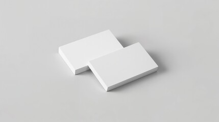 Blank business cards stacked on a smooth surface for printing or design use in a professional setting