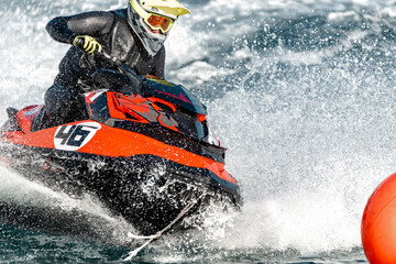 Jetski pilot is competing at high speed