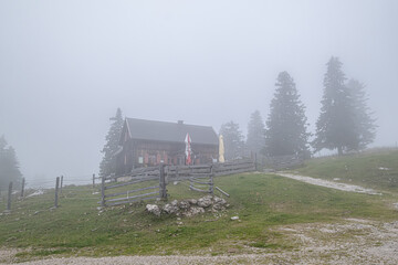 Obraz premium On hike from Gemeindealpe 1626 m summit down to Erlaufsee lake at 827 m, Lower Austria Limestone Alps in Mitterbach am Erlaufsee municipality, Styria, Austria