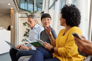 Portrait of a businesspeople sitting in chair and waiting for an interview for job application...