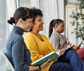 Portrait of a businesspeople sitting in chair and waiting for an interview for job application in...