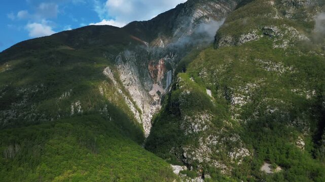 Boka waterfall, stunning scenic view of a tall waterfall on the side of mountain