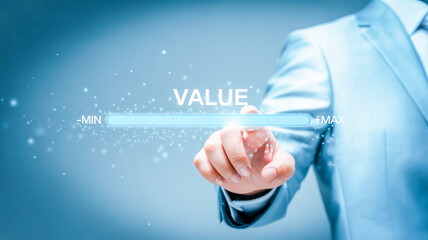 Person adjusting value slider on a digital interface with particles