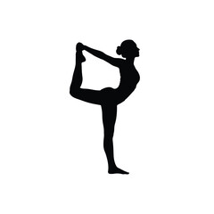 Silhouette of a woman in a yoga pose balancing on one leg and holding her foot behind her